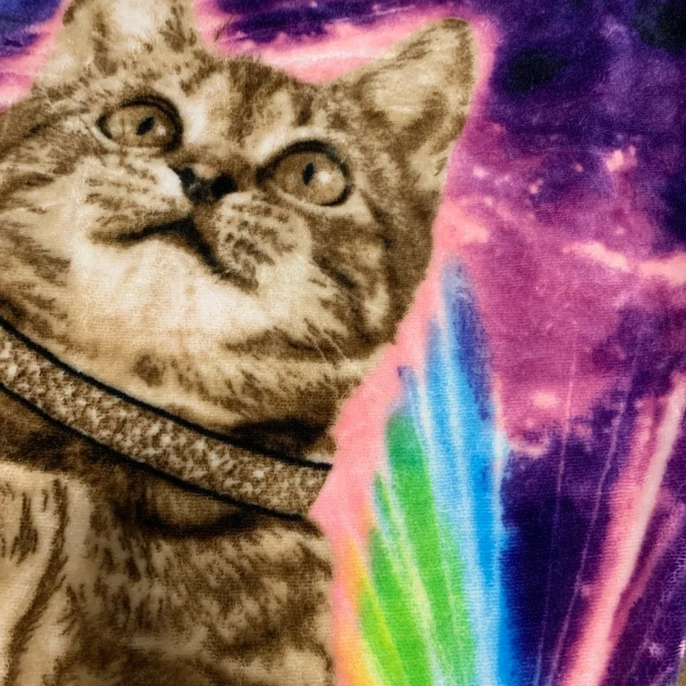 Throw blanket with cat on it
